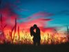 ai-generated-a-couple-s-passionate-kiss-under-a-vibrant-sunset-love-igniting-in-the-twilight-free-photo