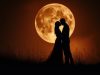 silhouette-couple-kissing-full-moon_379823-76628